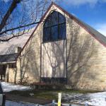 An existing underutilized community room and basement were remodeled into offices, a library, common room, kitchen, meeting rooms, and classrooms, including new mechanical systems and lighting.  New stained glass windows and custom interior wood work compliment the church's historic architecture.