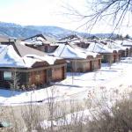 Street view - two-story units at near end, one-story units in the distance.