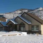 This custom home built in Dalton Ranch, north of Durango, Colorado, features a stepped gabled roof which mimics Missionary Ridge beyond.  